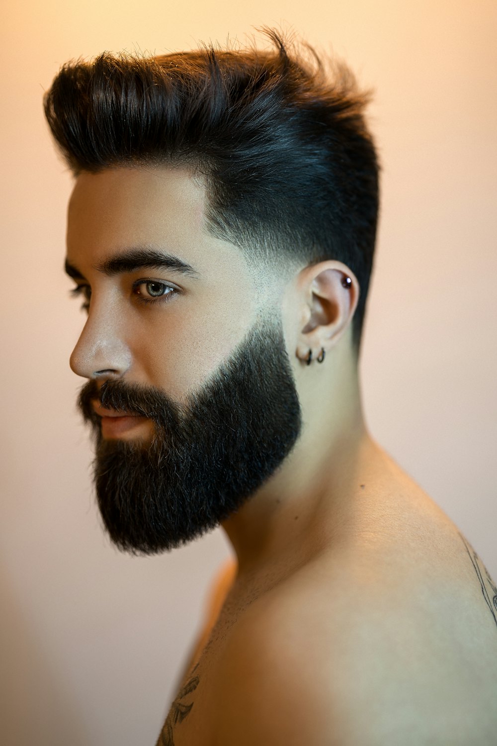 Man with a beard and a fade