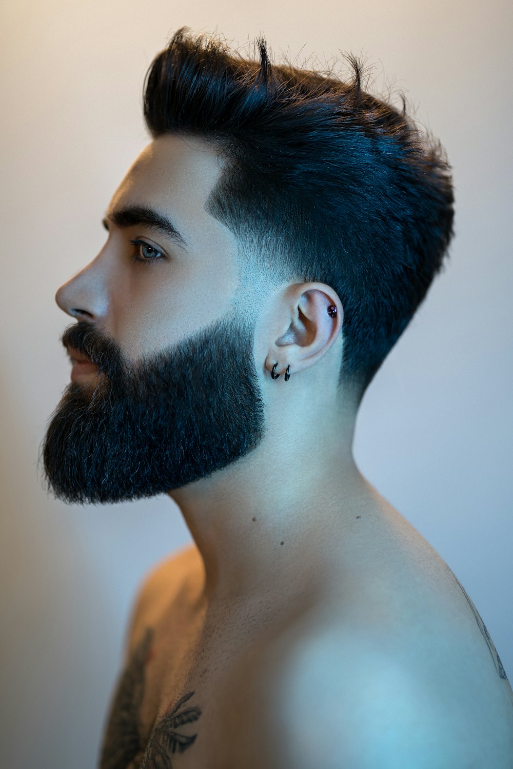 Profile of a man with a thick full beard